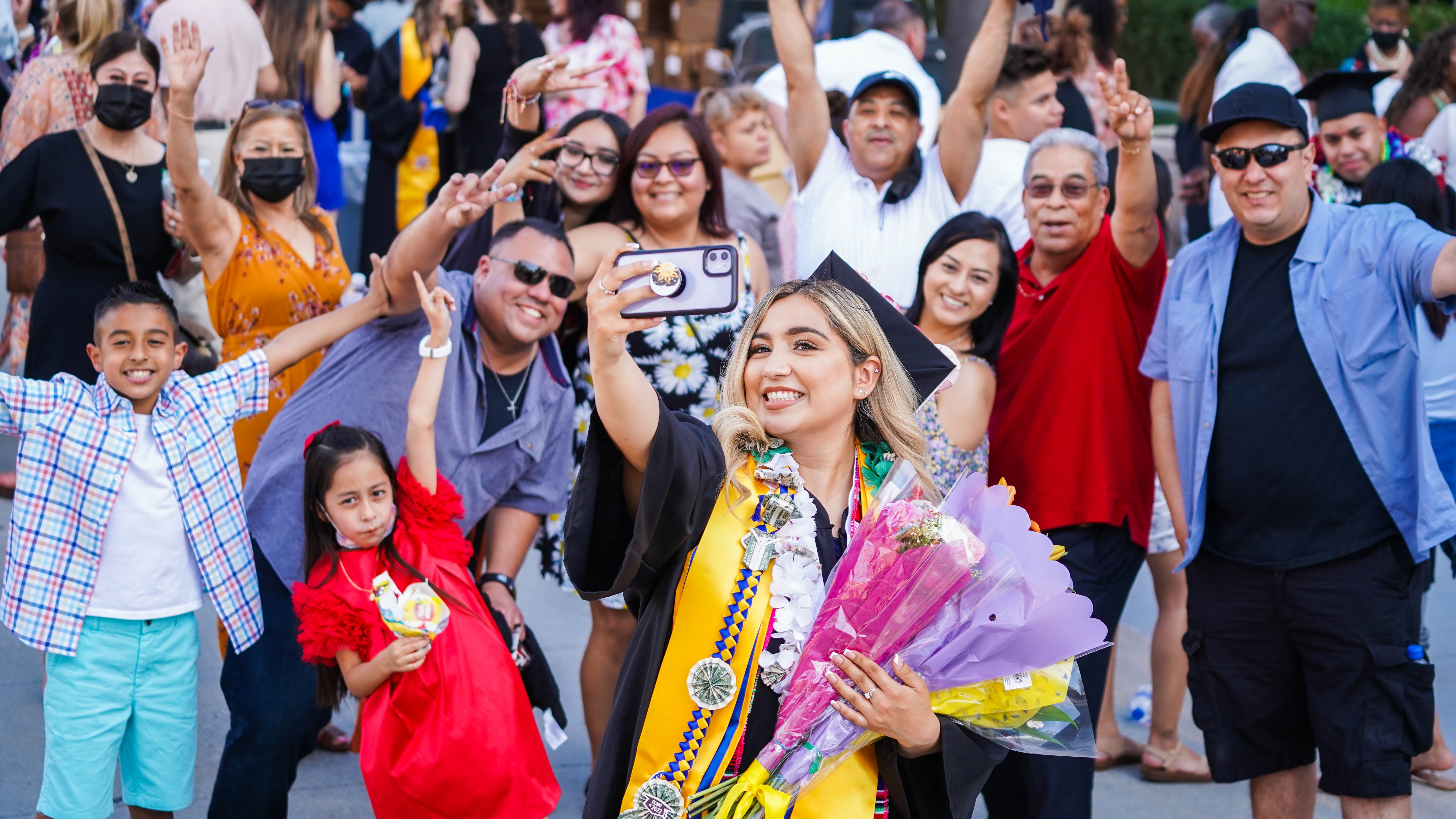 SJSU graduate with their family