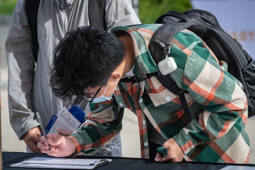 Student filling out a form
